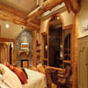 log mantle in log home bedroom